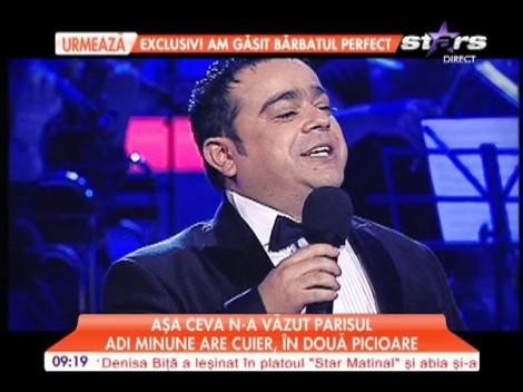 Privi&#355;i &#351;i v&#259; minuna&#355;i! Un om lucreaz&#259; pentru Adrian Minune pe post de... cuier!