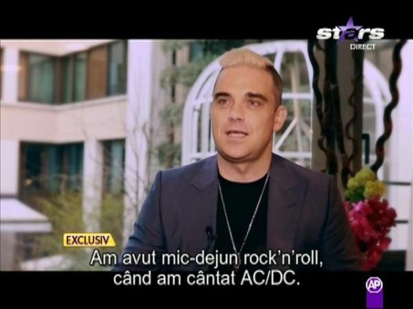Nu mai e mult și-l vom avea &icirc;n Rom&acirc;nia! Antena 1 și Radio ZU prezintă un interviu EXCLUSIV cu Robbie Williams