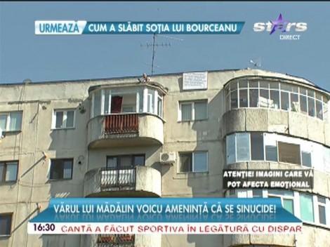 Vărul lui Mădălin Voicu, la un pas de sinucidere! Lăutarul ameninţă că se aruncă în gol de pe un bloc din Bucureşti