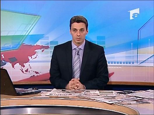 Badea se ofera sa taie fructe de pe capul lui Boc