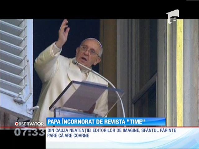 Papa Francisc &icirc;ncornorat de revista "Time"