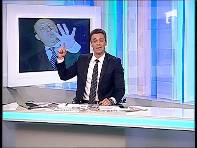 Mircea Badea: "Eu sunt patriot, aşa că am decis să pun poza lui Băsescu în platoul emisiunii"