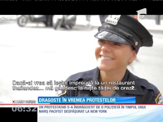 Săgeata lui Cupidon loveşte &icirc;n cele mai neaşteptate momente! Un t&acirc;năr s-a &icirc;ndrăgostit de o poliţistă la un protest
