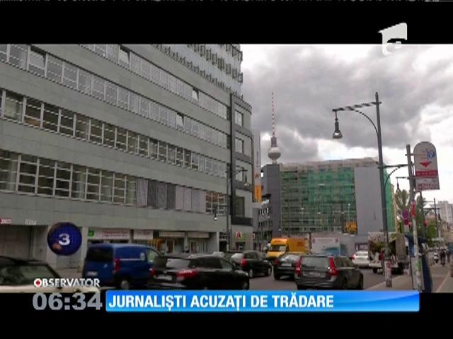 Jurnalişti ai unui site de ştiri din Germania sunt acuzaţi de trădare