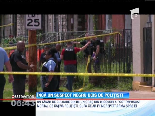 T&acirc;năr de culoare &icirc;mpuşat mortal de poliţişti