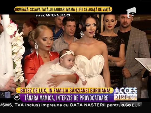 Botez de lux &icirc;n familia S&acirc;nzianei Buruiană! Naşa micuţei a strălucit şi a &icirc;ntors toate privirile