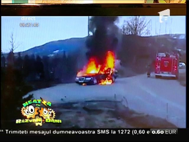 Smiley News: O maşină &icirc;n flăcări s-a dovedit a fi misiune imposibilă pentru un echipaj de pompieri