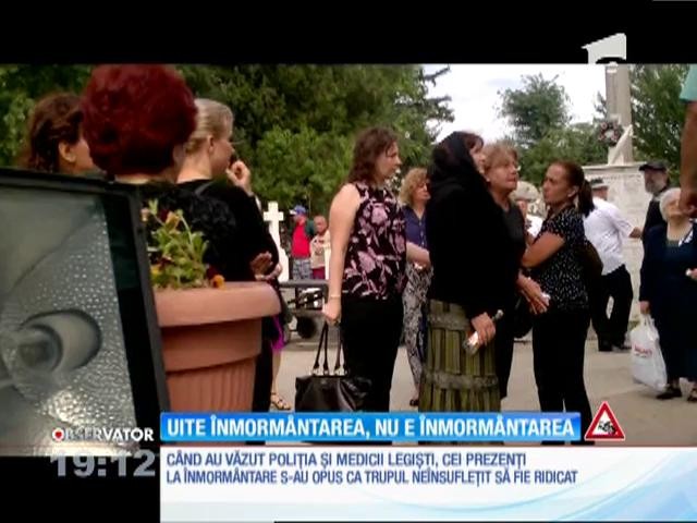 Moment şocant &icirc;ntr-un cimitir din Bucureşti, după ce legiştii au oprit funeraliile unei doamne