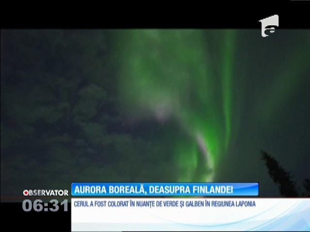 Imagini uimitoare! Aurora boreală, deasupra Finlandei. Cerul a fost colorat în nuanţe de verde şi galben
