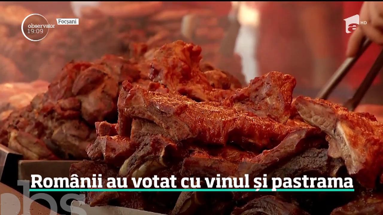 Rom&acirc;nii au votat cu vinul şi pastrama &icirc;n prima zi de referendum