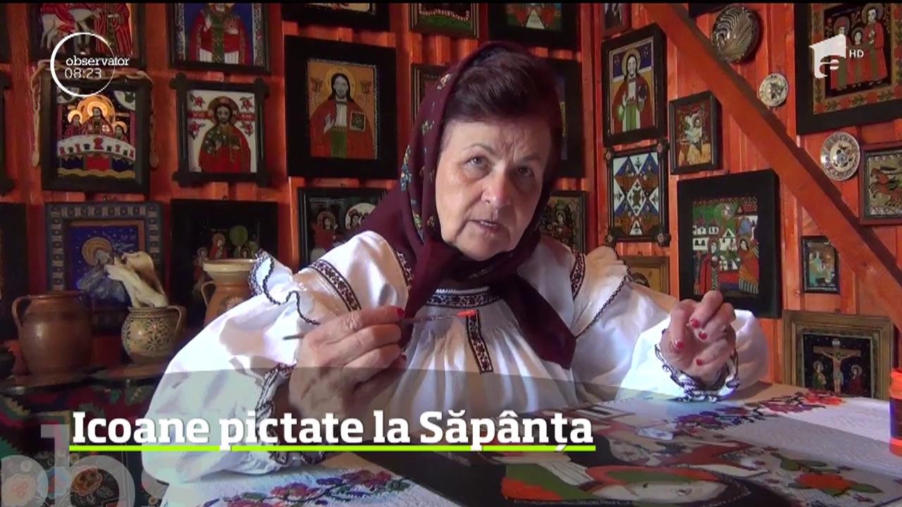 Soţia preotului din Săp&acirc;nţa pictează icoane pe sticlă