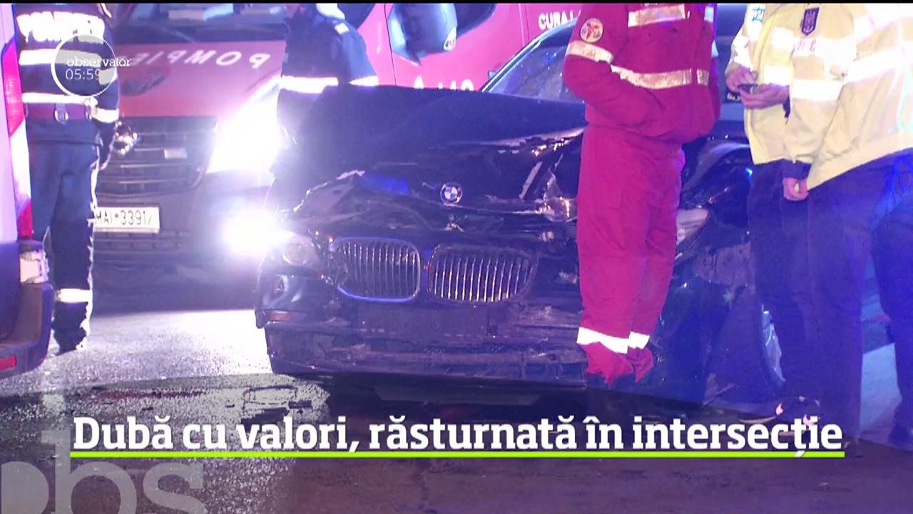 O dubă de transport de valori s-a răsturnat &icirc;ntr-o intersecţie intens circulată, din cartierul Militari, după un impact puternic cu un alt autoturism