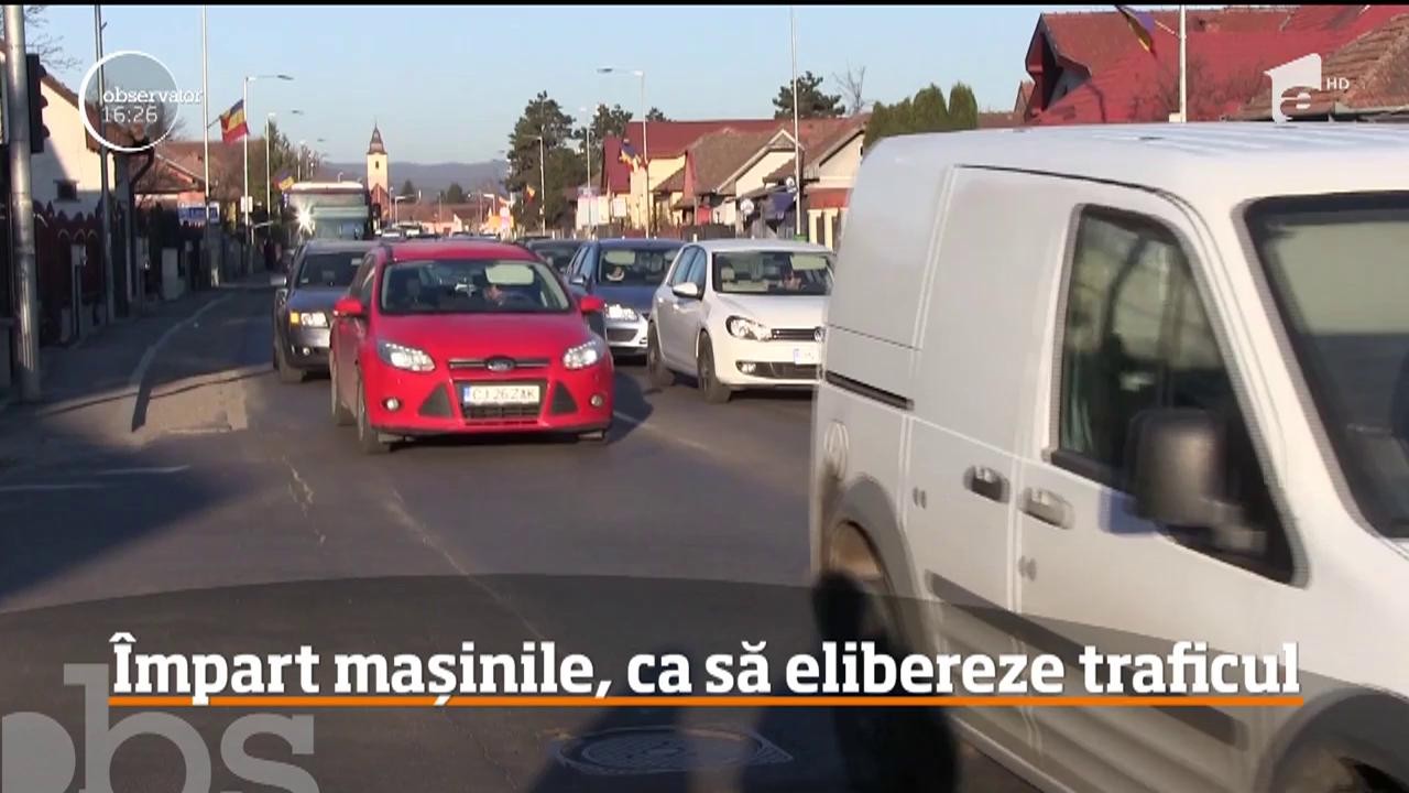 &Icirc;mpart mașinile, ca să elibereze traficul. Metoda prin care nimeni nu mai stă blocat &icirc;n trafic