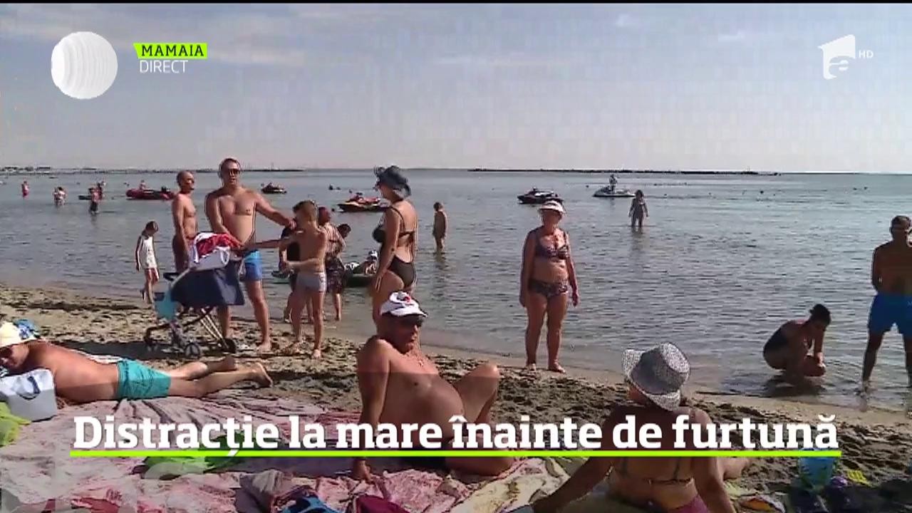 Distracție la mare &icirc;nainte de furtună