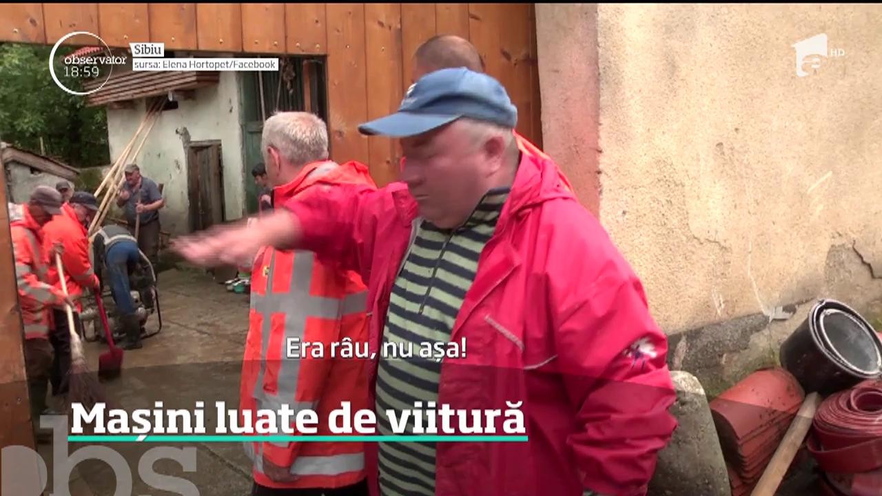 &Icirc;ntr-o localitate din Sibiu, oamenii s-au refugiat pe dealuri şi au privit cu lacrimi &icirc;n ochi cum apele le iau maşinile şi animalele şi le distrug casele