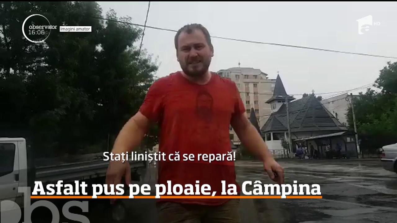 Muncitorii din C&acirc;mpina care repară gropile ce s-au format pe străzile principale, nu ţin cont de vreme