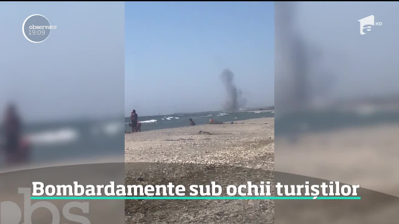Pe litoral, ca la război! Aşa s-au simţit mai mulţi turişti aflaţi pe plaja de la Vadu. Au privit &icirc;nspăim&acirc;ntaţi mai multe explozii puternice