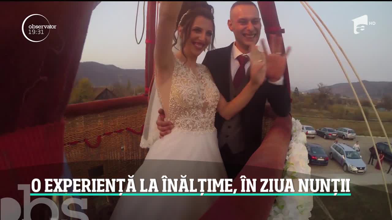 Un cuplu a avut parte de o nuntă la &icirc;nălţime. Petrecerea s-a mutat deasupra oraşului Deva şi a fost o surpriză cu emoţii fără egal