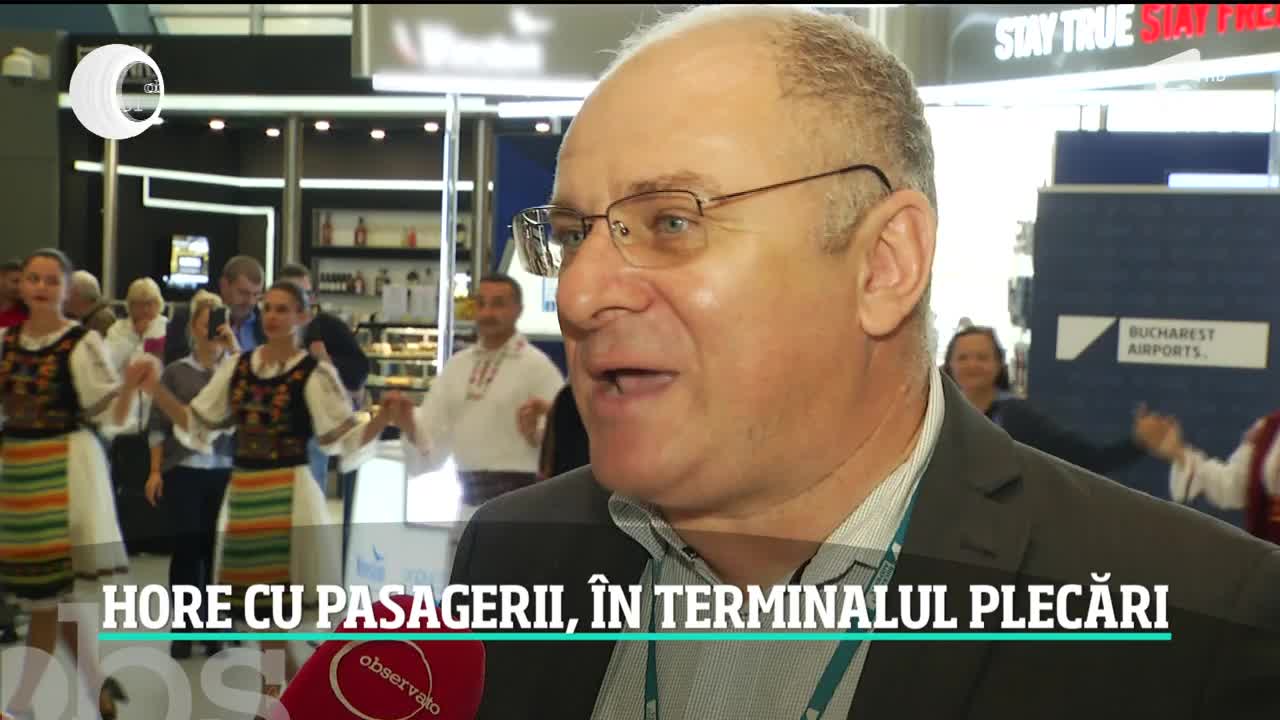 Călătorii care au ieşit din ţară au plecat &icirc;n paşi de dans. Pe cel mai mare aeroport al ţării rom&acirc;nii şi străinii s-au prins &icirc;n horă