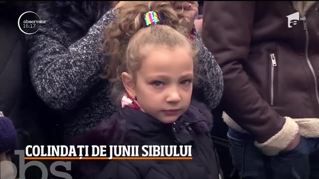 Turiști colindați de junii Sibiului &icirc;n a doua zi de Crăciun