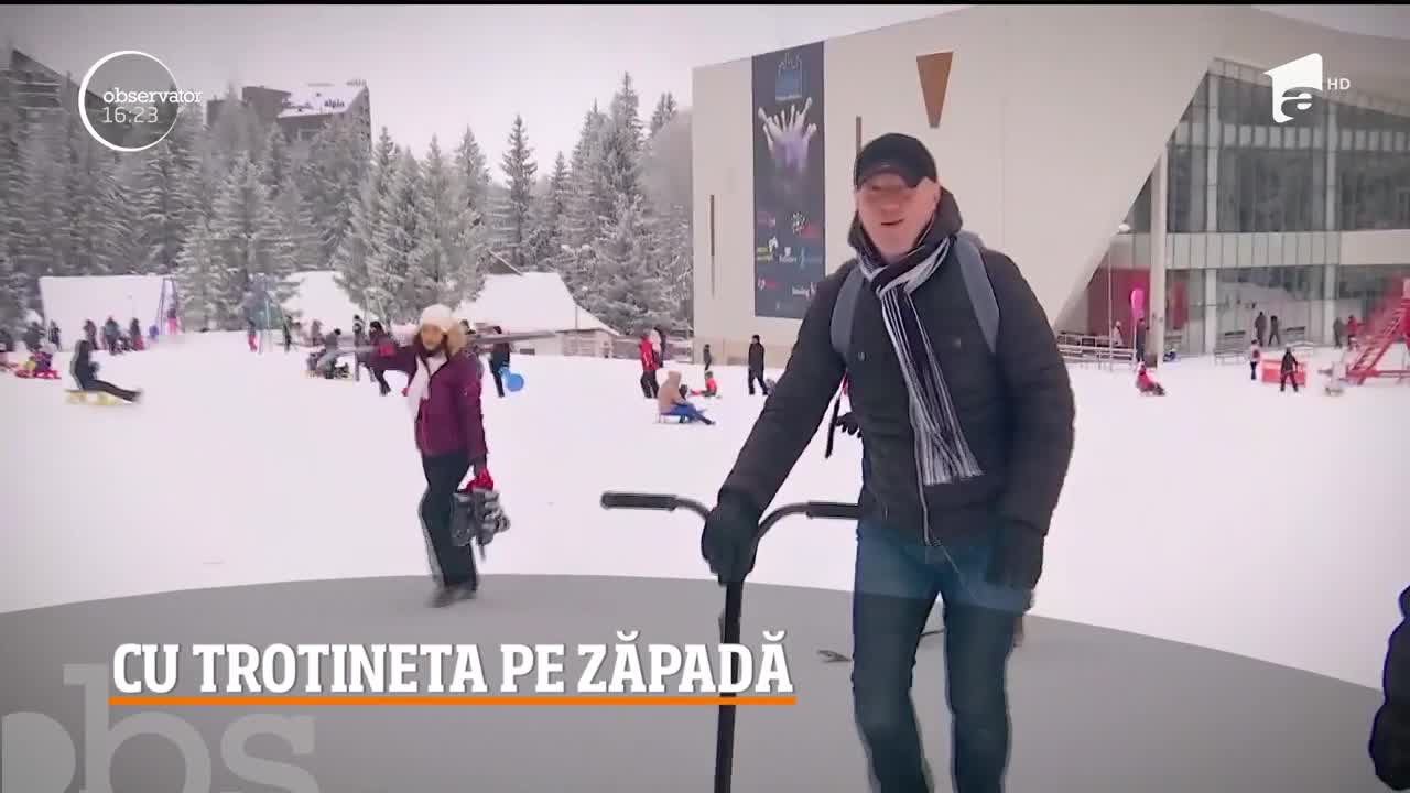 O nouă distracţie a apărut pe p&acirc;rtiile din Poiana Braşov: trotineta de zăpadă, un fel de placă de snowboard cu m&acirc;ner, asemănător celui al popularelor vehicule pe două roţi