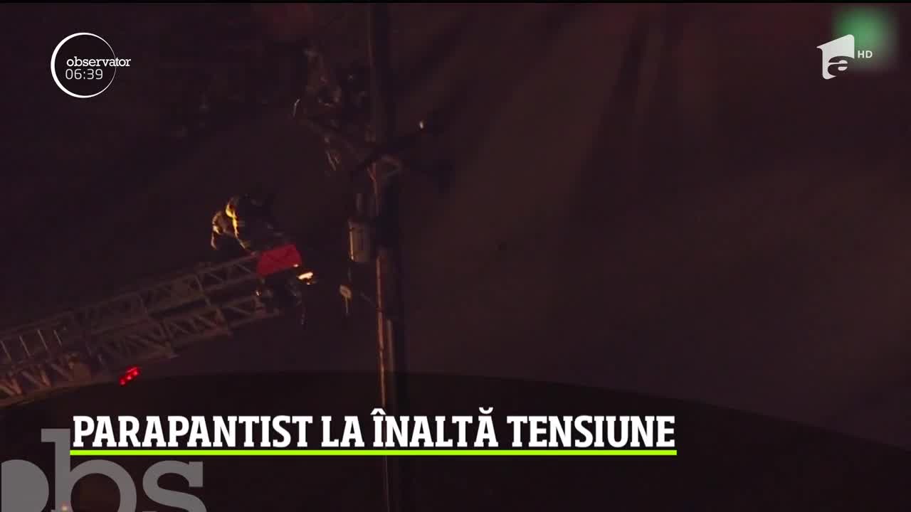 Parapantist prins &icirc;n cablurile unei reţele de &icirc;naltă tensiune