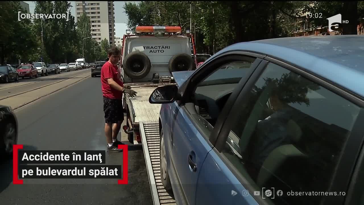 &Icirc;n toiul verii, o stradă din Bucureşti s-a transformat &icirc;n patinoar. Au fost accidente &icirc;n lanţ: carambol de maşini, biciclişti şi motociclişti răniţi