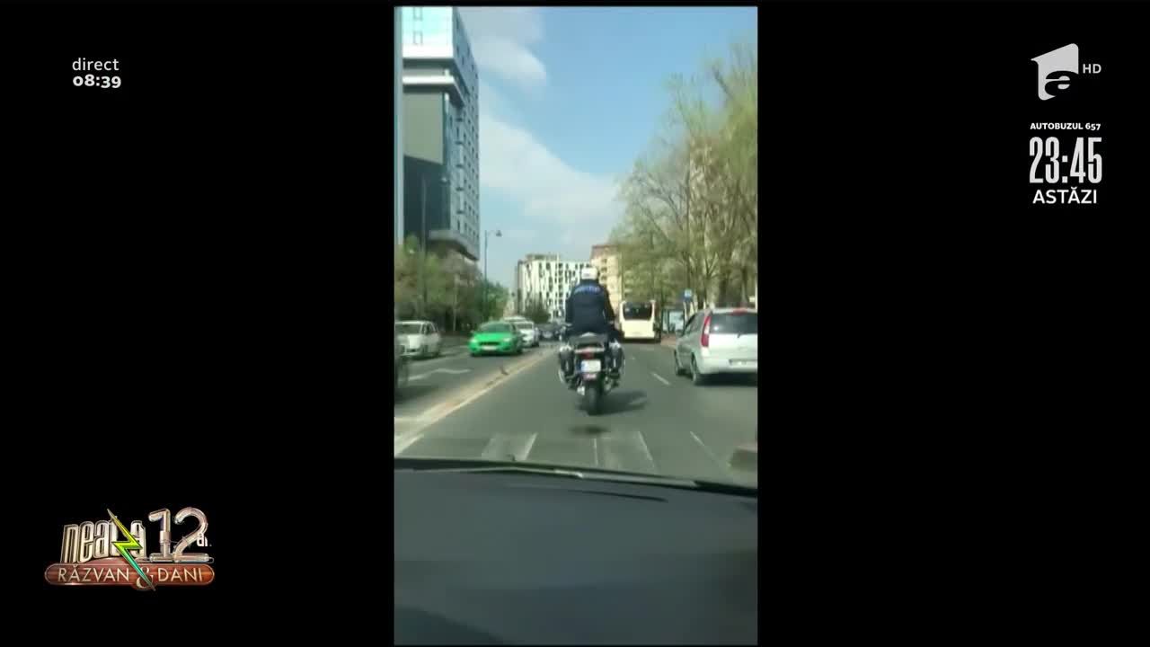 Faza zilei! Un agent din București dansează pe motocicletă, în trafic! | Video