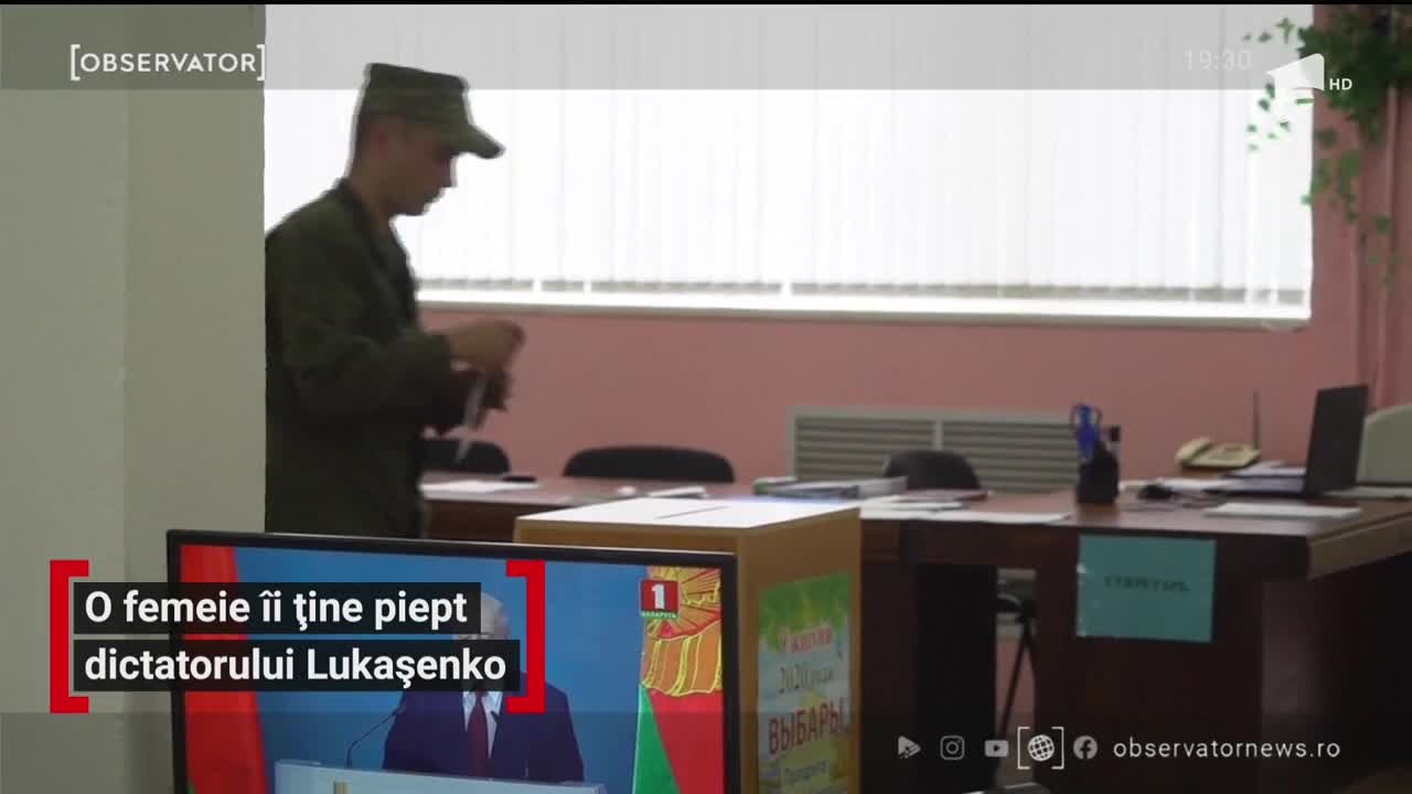 O femeie &icirc;i ține piept dictatorului Lukașenko