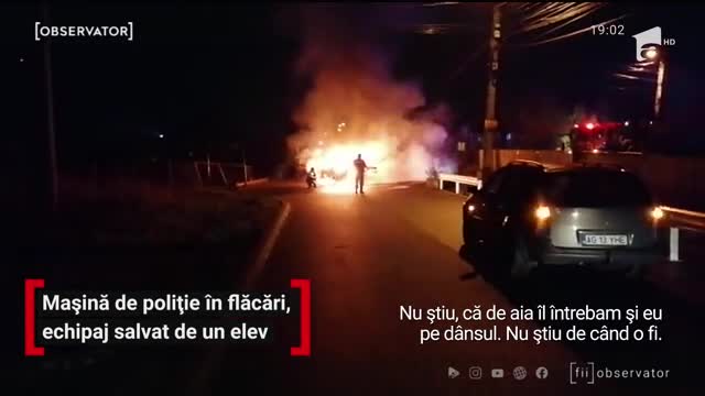 Doi poliţişti şi un jandarm, captivi &icirc;ntr-o maşină de poliţie &icirc;n flăcări, au fost salvaţi de un elev