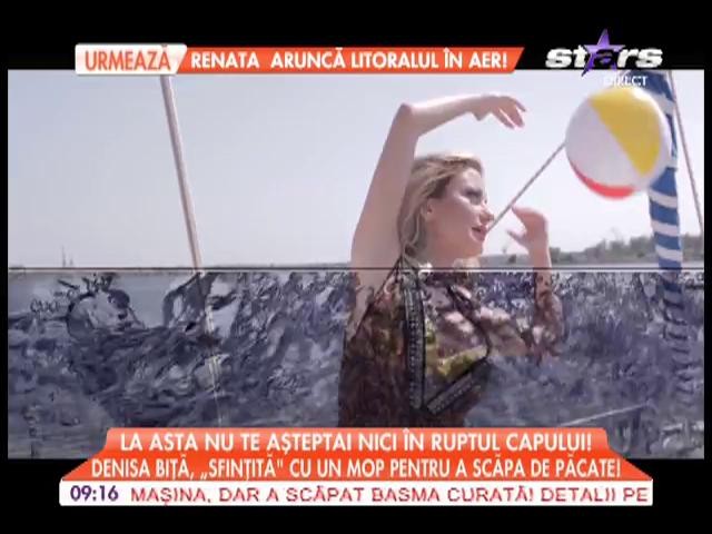 Denisa B&icirc;tă, sfinţită cu un mop pentru a scapă de păcate!
