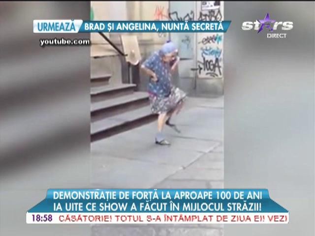 Dans &icirc;n mijlocul străzii la aproape 100 de ani