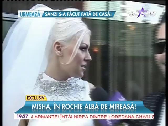 Misha, &icirc;n rochie albă de mireasă