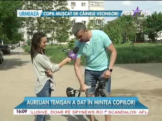 Aurelian Temişan a dat &icirc;n mintea copiilor! A renunţat la maşină pentru... trotinetă!