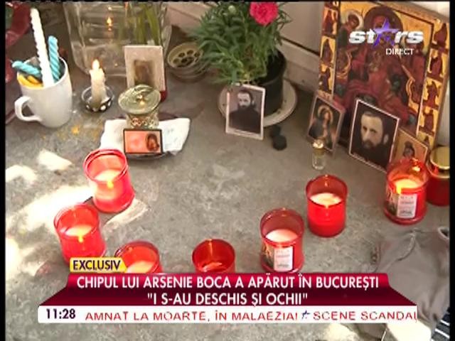 O MINUNE! Chipul lui Arsenie Boca a apărut &icirc;n curtea unor bucureşteni