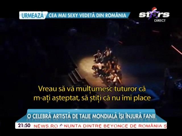 Huiduielile spectatorilor au scos-o din minţi! Madonna şi-a &icirc;njurat fanii ca la uşa cortului chiar de pe scenă
