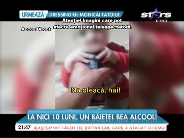 La nici 10 luni, un băieţel bea alcool!