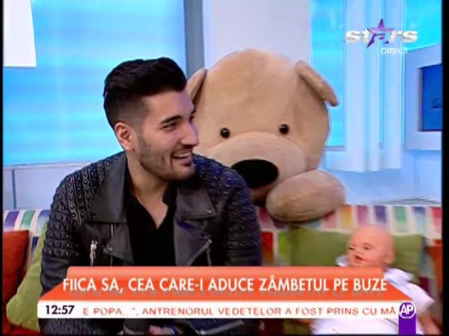 Nadir, un tătic neconveţional! A demonstrat că ştie să &icirc;mbrace un bebeluş!