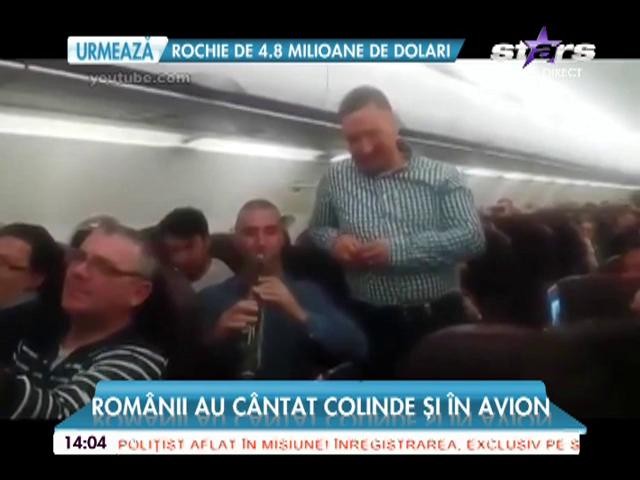Rom&acirc;nii au c&acirc;ntat colinde &icirc;n avion