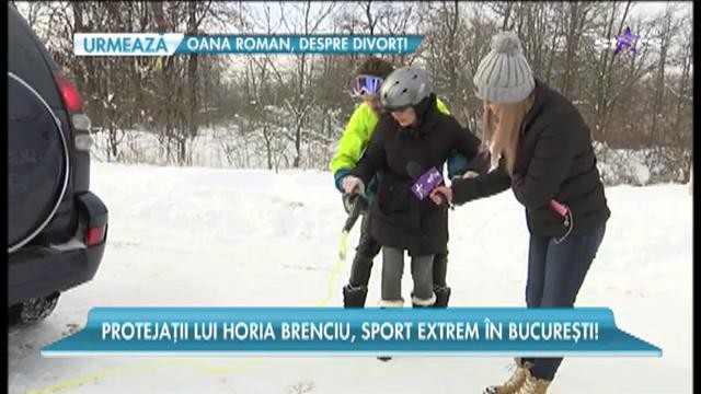 Vlad și Andra, membrii trupei Instinct, foști concurenți X Factor, se dau cu placa de snowboard prin Capitala &icirc;nzăpezită
