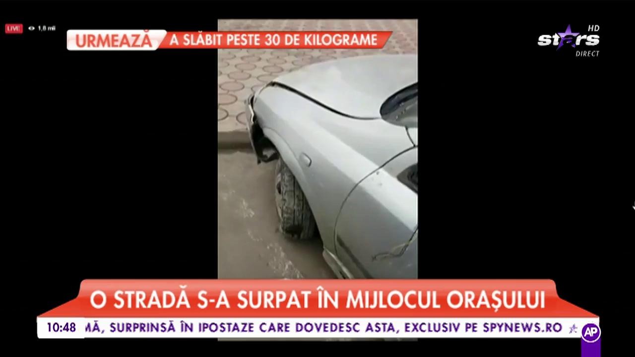 Un șofer s-a trezit cu mașina &icirc;ntr-un carter imens format pe o stradă din R&acirc;mnicu Sărat!