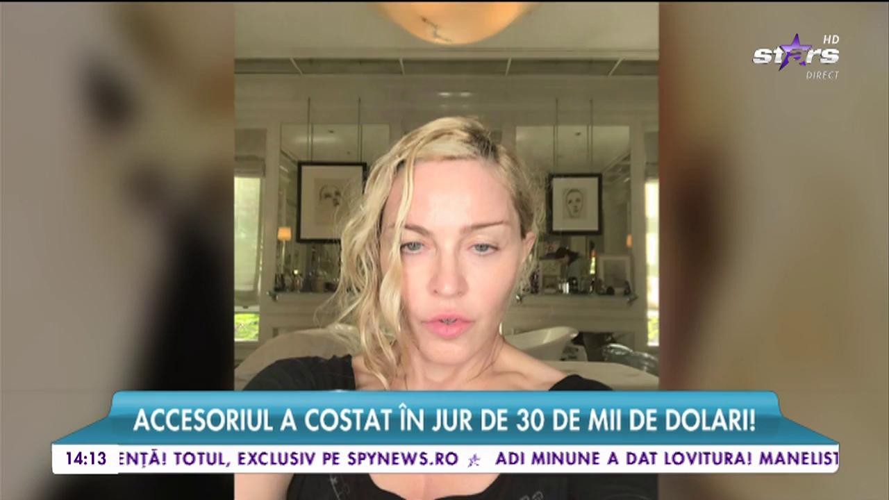 Madonna şochează din nou, de data asta prin z&acirc;mbet!
