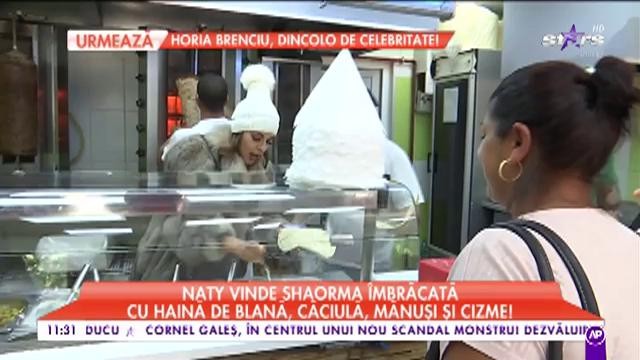STARroganţa: Natalia vinde shaorma &icirc;mbrăcată cu haine de blană, căciulă, măsuri și cizme