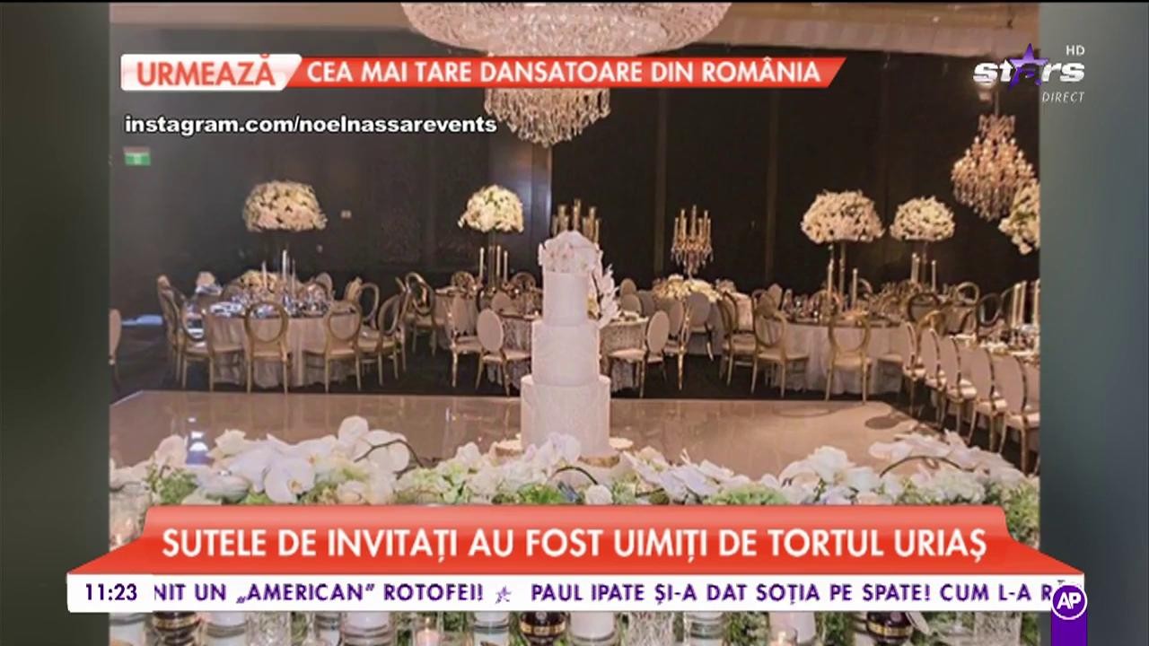 Sutele de invitați au fost uimiți de tortul uriaș. Mireasa a purtat o rochie model unicat