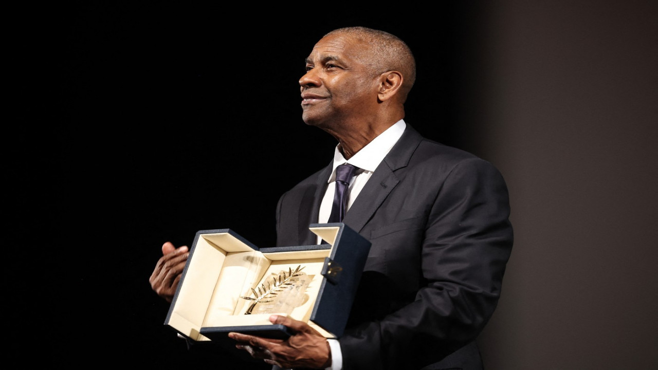 Denzel Washington a primit premiul onorific Palme d’Or la Festivalul de Film de la Cannes. Actorul a avut parte şi de un incident pe covorul roşu